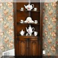 F08. Corner book shelf with cabinet. 66&rdquo;h x 18&rdquo;d x 26&rdquo;w 